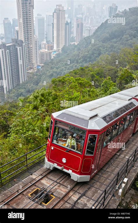 The Peak Tram going up to Victoria Peak. Hong Kong, China Stock Photo ...