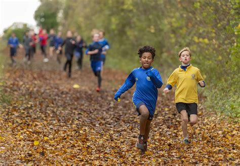 Pupils pull on the trainers for Cambridge School Sports Partnership Inter-School Cross Country