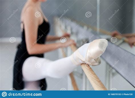 Ballerina Has Dance Workout In Ballet Class Room Girl Is Stretching