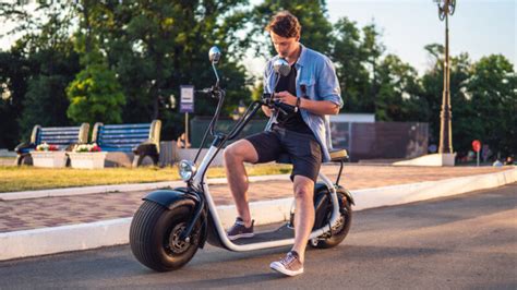 Electric Scooters with Seats or Seat Attachments