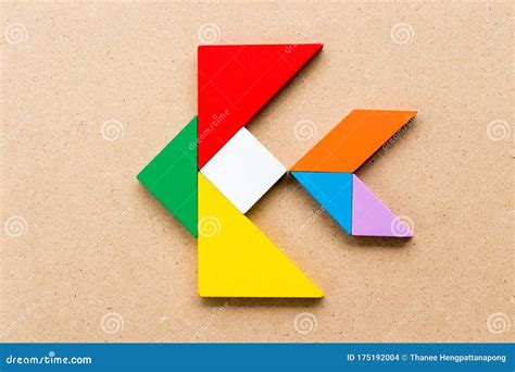 Color Tangram In Fish Shape On Wood Background Stock Photo Image Of