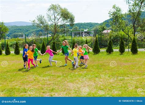 Large Group of Kids Play Outdoor Games Stock Photo - Image of cheerful ...