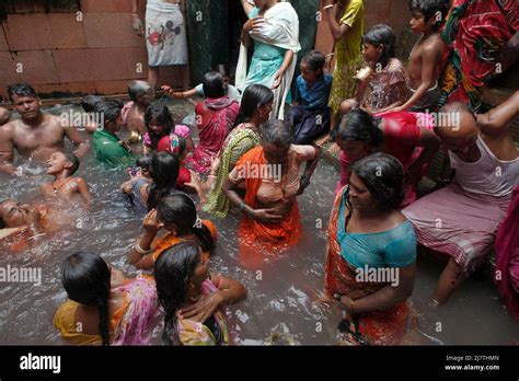 People Taking A Bath At A Hot Spring Which Is Believed To Have Curative Qualities Inside