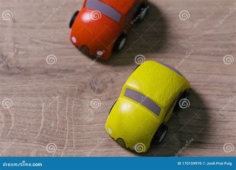 Red and Yellow Toy Cars on a Wooden Floor Stock Photo - Image of small ...