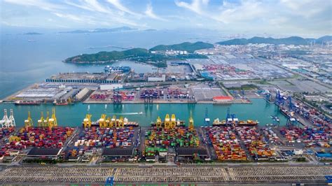 Premium Photo Aerial View Commercial Sea Port Warehouse And Crane