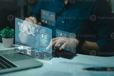 Businessman using laptop online income tax return form, tax payment
