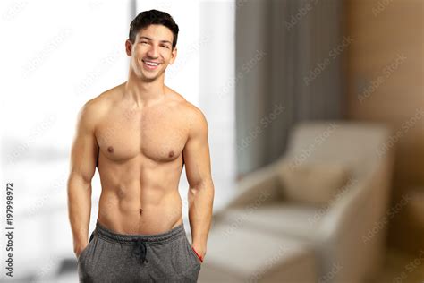 Portrait Of A Well Built Shirtless Muscular Male Model Stock Photo