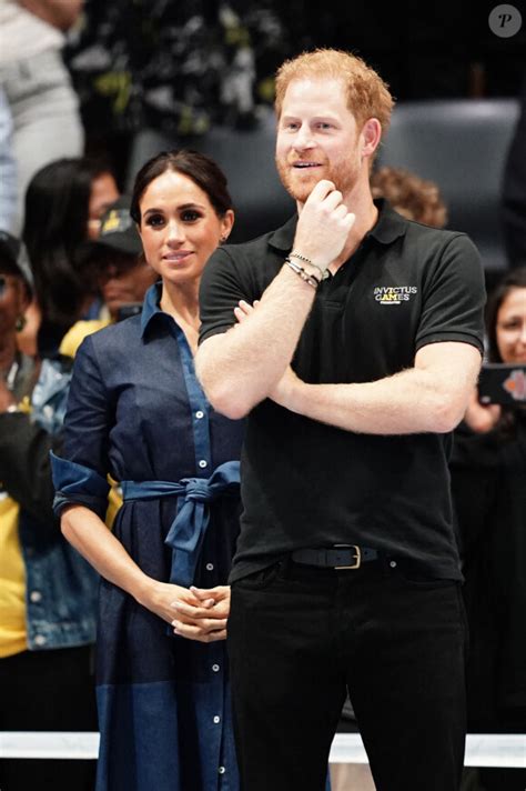 PHOTOS Prince Harry et Meghan très tactiles aux Invictus Games le