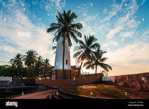 Galle Dutch Fort Lighthouse And Coconut Trees In Sri Lanka Stock Photo