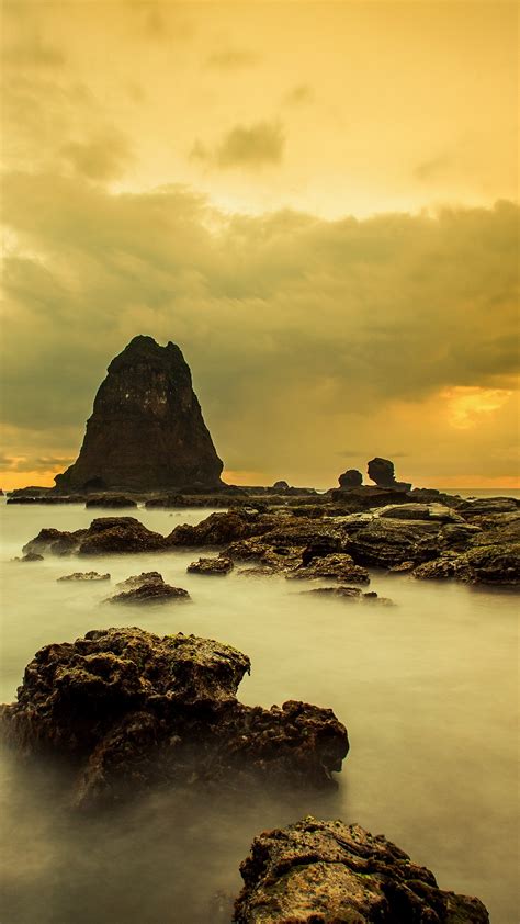 Tanjung Papuma at sunset in Jember Regency of East Java, Indonesia ...