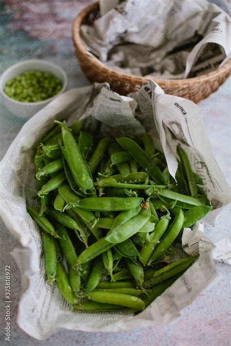 Pile Of Empty Pea Pods In Newspaper Stock Photo Adobe Stock