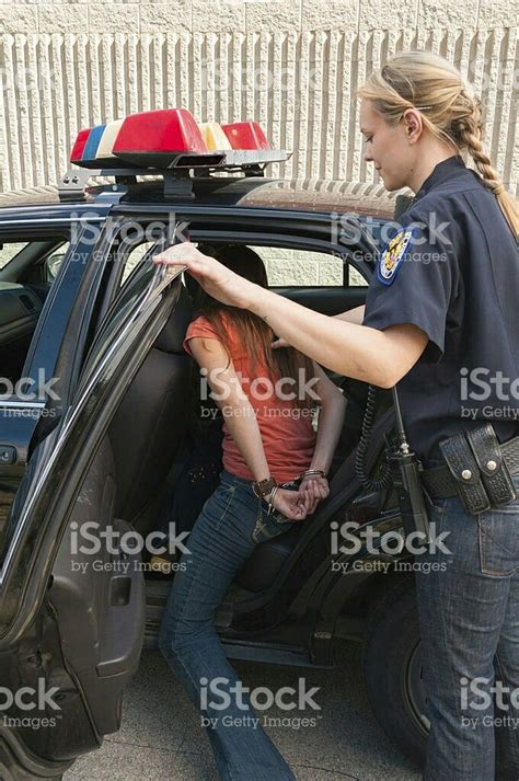 Female Cop Arresting Young Woman With Handcuffed Hands Behind Her Back Handcuffed Cuffed