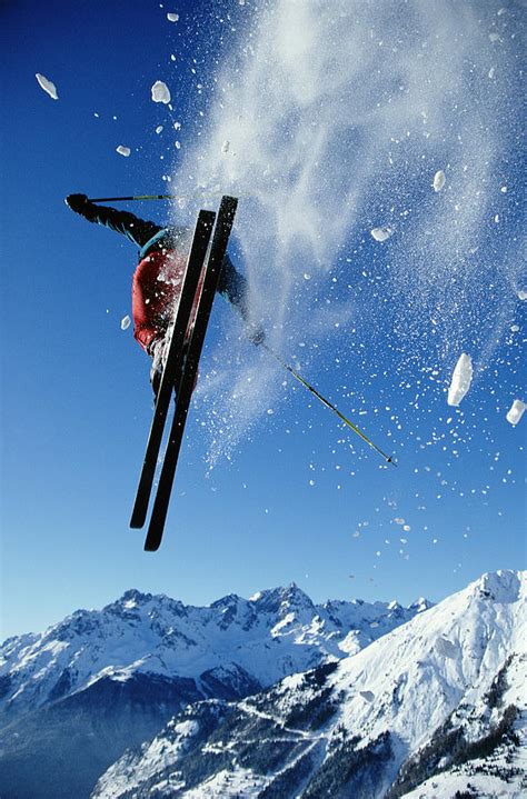 downhill skier  mid air rear view  ross woodhall