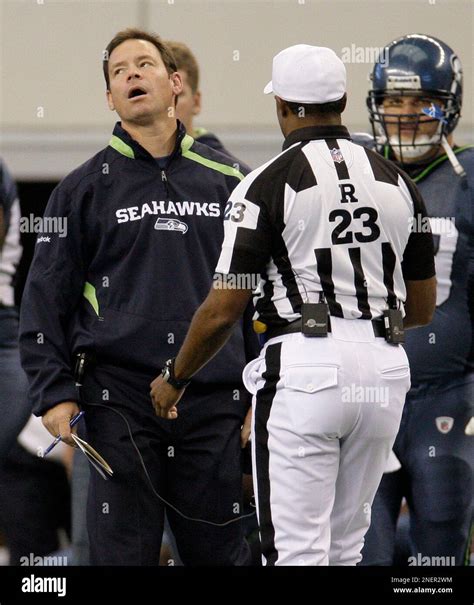 Seattle Seahawks coach Jim Mora, reacts to a conversation with Referee ...