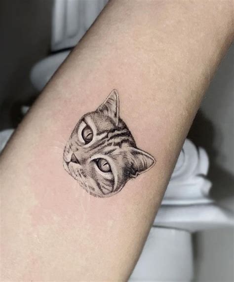 Micro Cat Tattoo Designs