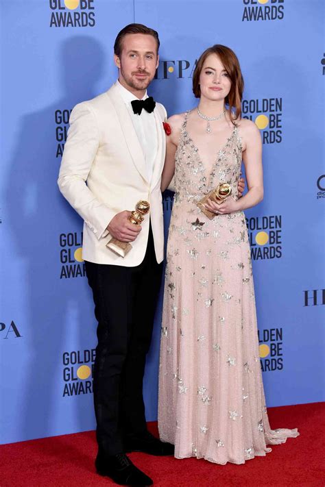 Emma Stone Wore A Floral Naked Dress On The 2024 Golden Globes Red Carpet