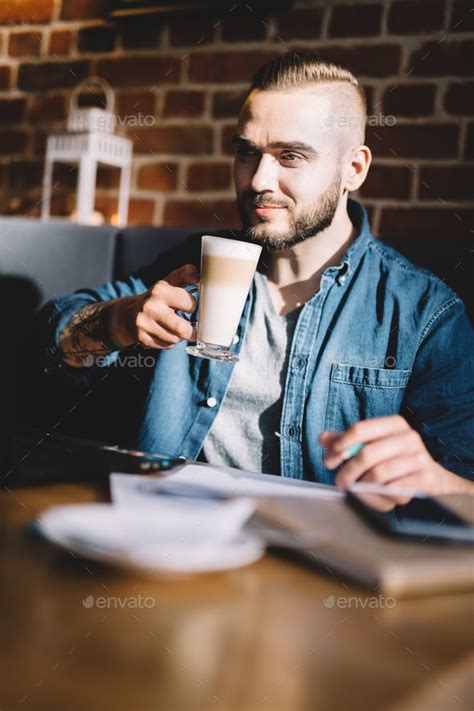 Man Drinking Coffee In A Restaurant Man Cafe Coffee Drinks Men Coffee