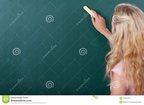 Female Teacher Writing On Chalkboard Stock Photo Image Of Closeup