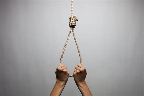 Hands Holding Rope Slipknot In Concept Suicide Stock Photo Download