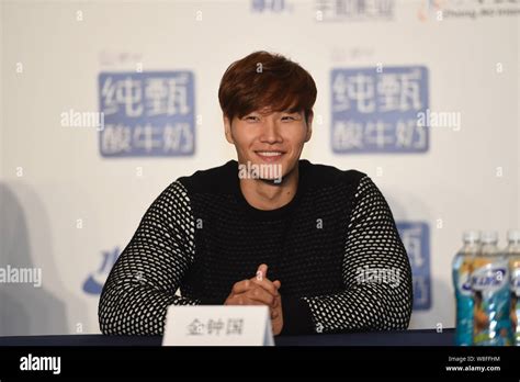 South Korean Singer Kim Jong Kook Smiles During A Promotional Event For