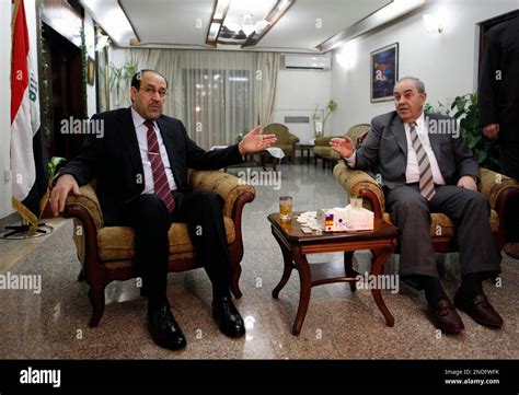 Iraqi Prime Minister Nouri Al Maliki Left And Former Prime Minister