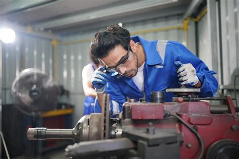 Premium Photo Auto Mechanics Making Wheel Alignment At The Car Service