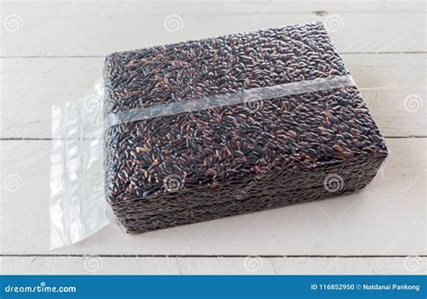 Brown Rice in a Bag on Wooden Background Stock Photo - Image of brown ...