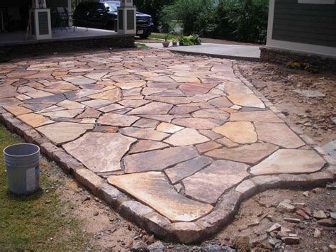 stacked stone garden edging | Brown Flagstone Garden Patio with moss ...