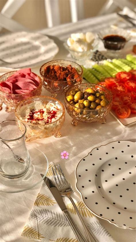 A Table Topped With Plates And Bowls Filled With Different Types Of