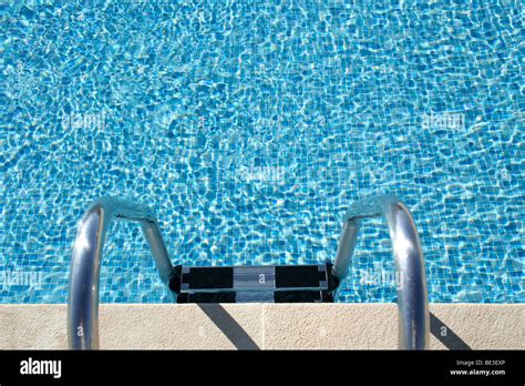 Hotel swimming pool with sunny reflections, great for summer and Stock ...