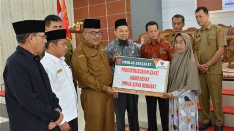 Baznas Agam Salurkan Bantuan Pada Ratusan Mustahik Didapati Dari