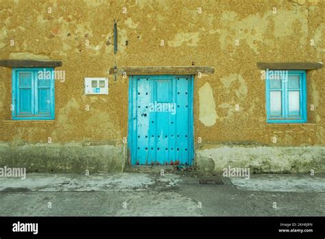 Detail of a house in typical adobe-style with bricks made of clay ...