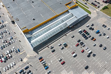 Aerial View Of Shopping Mall Parking Lot With Cars Standing On Parking ...