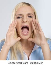 Screaming Blonde Woman On White Background Stock Photo 305008532 Shutterstock