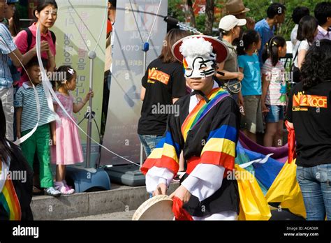 Traditional Korean Dancer wearing Sangmo or Ribbon Hat at a Gay Pride Parade in Seoul South ...