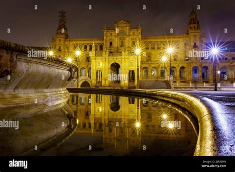 Plaza de España in Seville night scene after raining with long