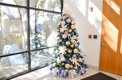 Elegant Christmas Tree in Blue Office Lobby