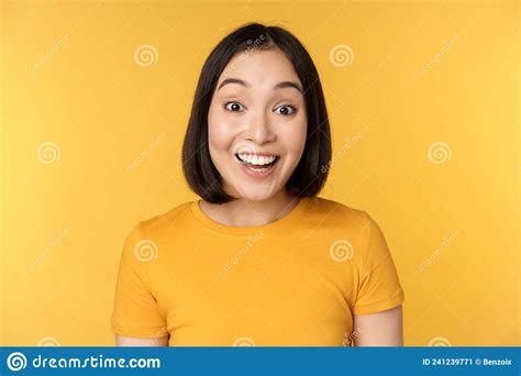 Close Up Portrait Of Asian Girl Showing Surprised Reaction Raising