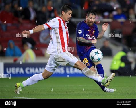 Barcelona's Lionel Messi (right) shoots for goal Stock Photo - Alamy