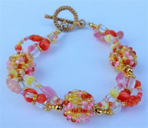 Yellow Orange And Pink Multi Strand Bracelet By Growlyhavenjewelry On