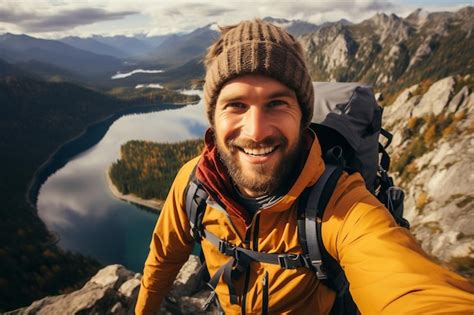 Premium Ai Image Hiker Taking Selfie On Mountain Ai