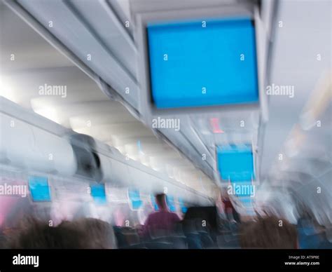 Interior of jet airliner during flight Stock Photo - Alamy