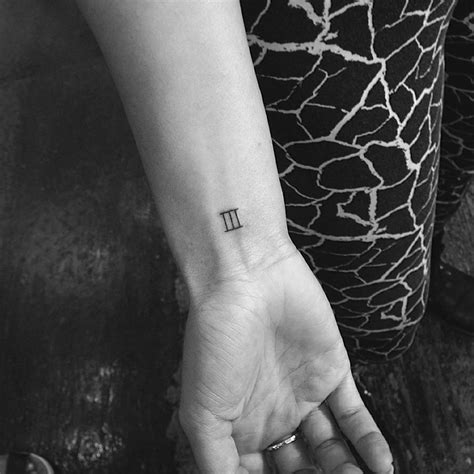 Roman Numeral Tattoo Located On The Wrist