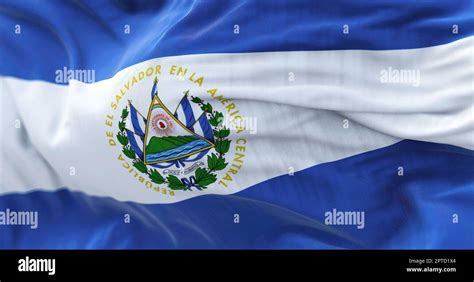 Close-up view of the El Salvador national flag waving in the wind. The Republic of El Salvador ...