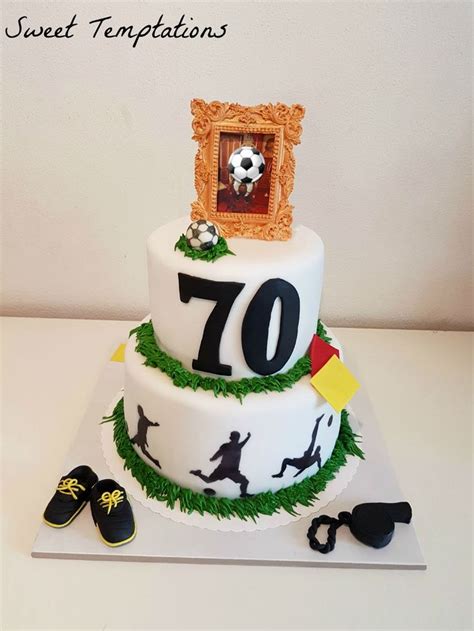 A Birthday Cake With An Image Of A Soccer Player On Top And Shoes Around It