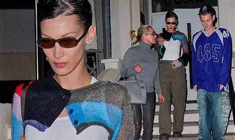 Bella Hadid Rocks Skintight Top With Cropped Cardigan In New York City