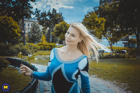 Mature Blonde Nadya Basinger Teasing With Her Hot Legs In A Short Blue