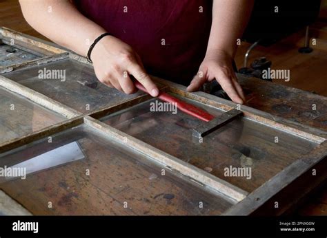 worker restoring broken wooden window frame Stock Photo - Alamy