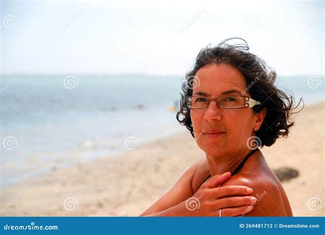 Portrait Of Pretty Tanned Mature Woman With Glasses Stock Photo Image Of Caucasian Breeze