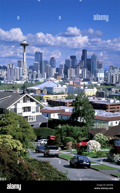 Houses and homes in Seattle Washington showing the skyline and the Space Needle vertical Stock ...